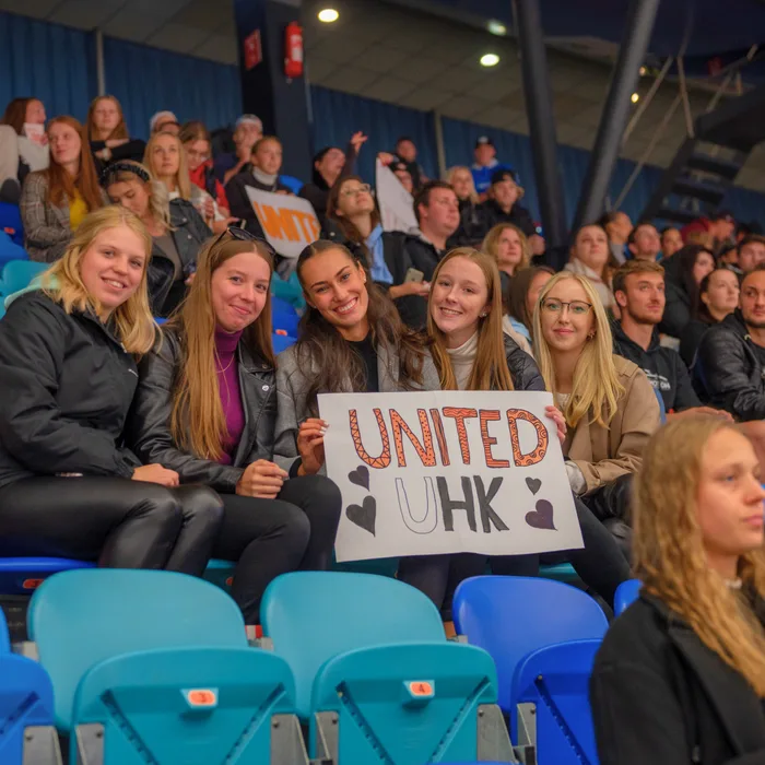 Fans with a UNIted UHK banner in the stands
